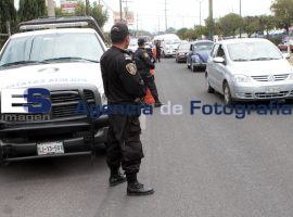Monta Polícia Estatal operativo en la entrada a la ciudad - ES imagen agencia de fotografía