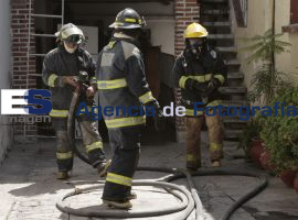 Incendio Negocio de Impresiones - ES imagen agencia de fotografía