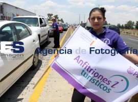 Volanteo de Promoción Turística en la Caseta de San Martín Texmelucan - ES imagen agencia de fotografía