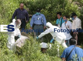 Hallan cadaver de una mujer en bolsas junto a la autopista a Atlixco - ES imagen agencia de fotografía