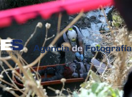 Cuerpo sin vida en rio Zapatero - ES imagen agencia de fotografía
