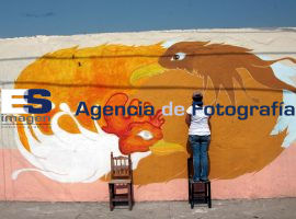 Colectivo Tomate pinta muros barrio de Xanenetla - ES imagen agencia de fotografía