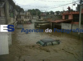 Desborda rio Atoyac en Texmelucan - ES imagen agencia de fotografía