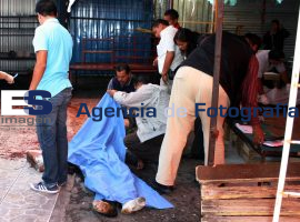 Lo encuentran muerto en el mercado Unión - ES imagen agencia de fotografía