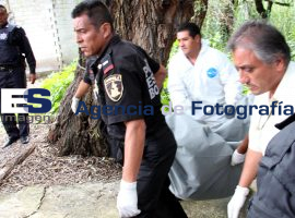 Levantamiento de cadaver prados Agua Azul - ES imagen agencia de fotografía