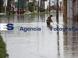 Inundación Av. Prolongación 14 sur y Mpío Libre - ES imagen agencia de fotografía
