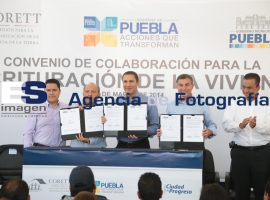 Entrega Coret escrituras em Puebla - ES imagen agencia de fotografía