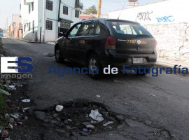 En la Colonia Reforma Sur se observan gran número baches - ES imagen agencia de fotografía